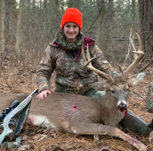 woman with muzzle loader buck